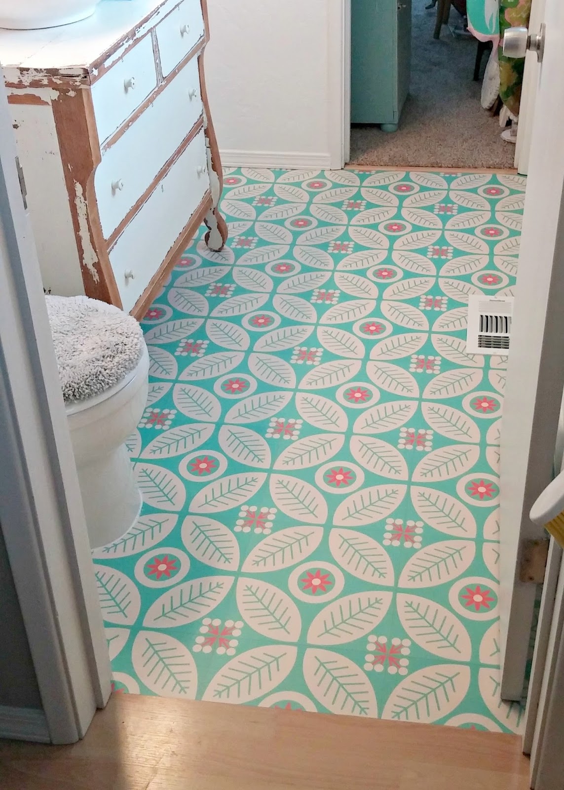 Removable floor tiles